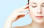 Woman concentrating with eyes closed